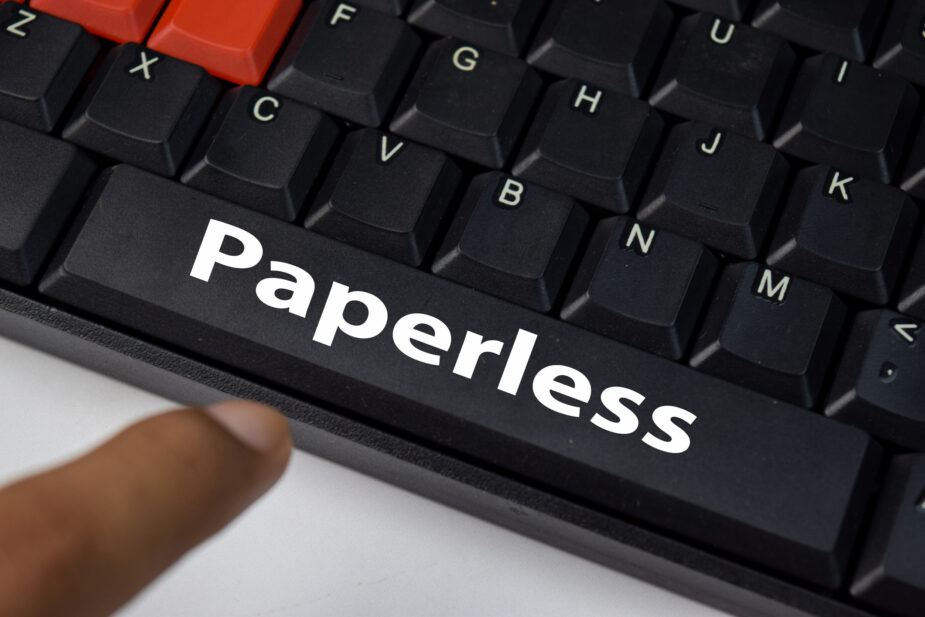 Paperless isolated on laptop keyboard background.