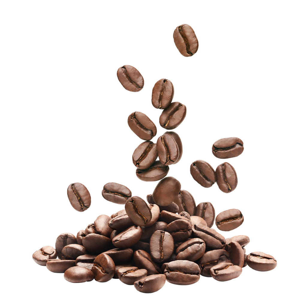 Roasted coffee beans are captured in mid-air, falling onto a small pile of beans below.